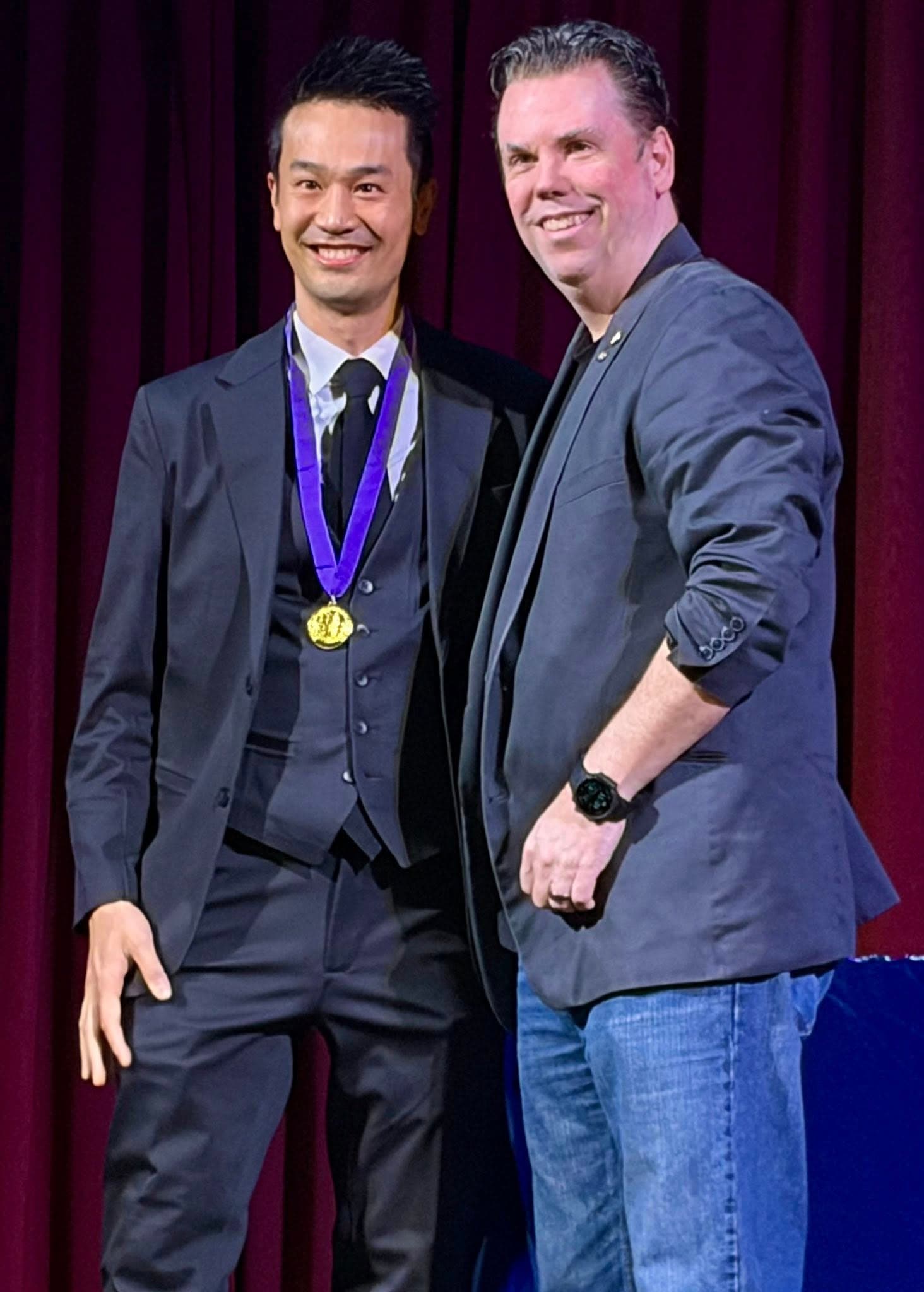 Kel receiving the PCAM 2026 gold medal for Comedy Magician of the Year