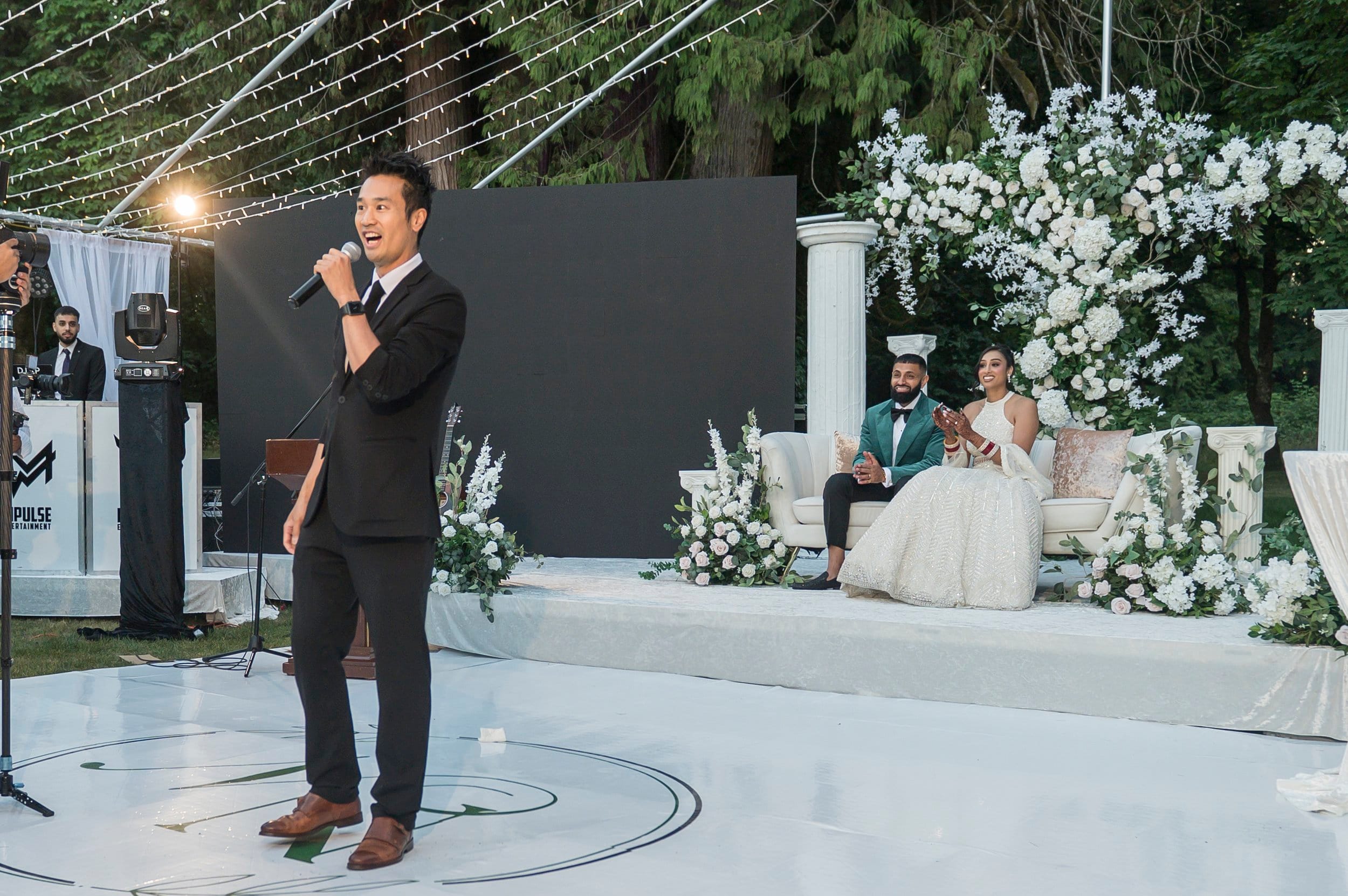 On the mic for the program, Neeraj and Natasha’s wedding.