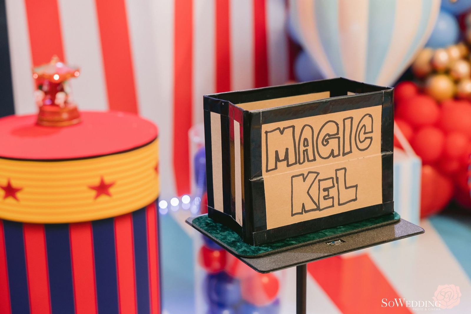 Custom carnival crate prop hand-lettered for the magician, styled by Blooms and Paper